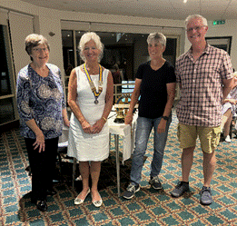 A group of people posing for a photo Description automatically generated